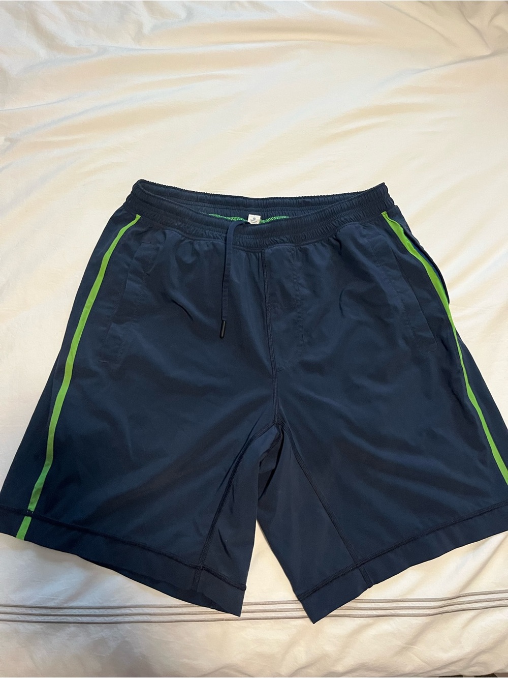 lululemon athletica Navy Athletic Shorts with Lime Green Side Stripes